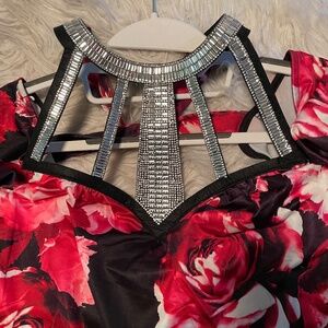 Cut outs and bling accent this unique piece.